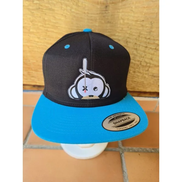 Monkey Climber Gorra negra y visera azul